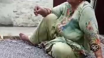 Sizzling Desi Aunty Puffs On A Smoke With Seductive Flair